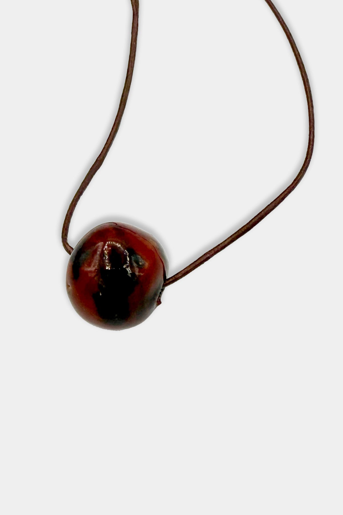 Red Bead with Brown Cord